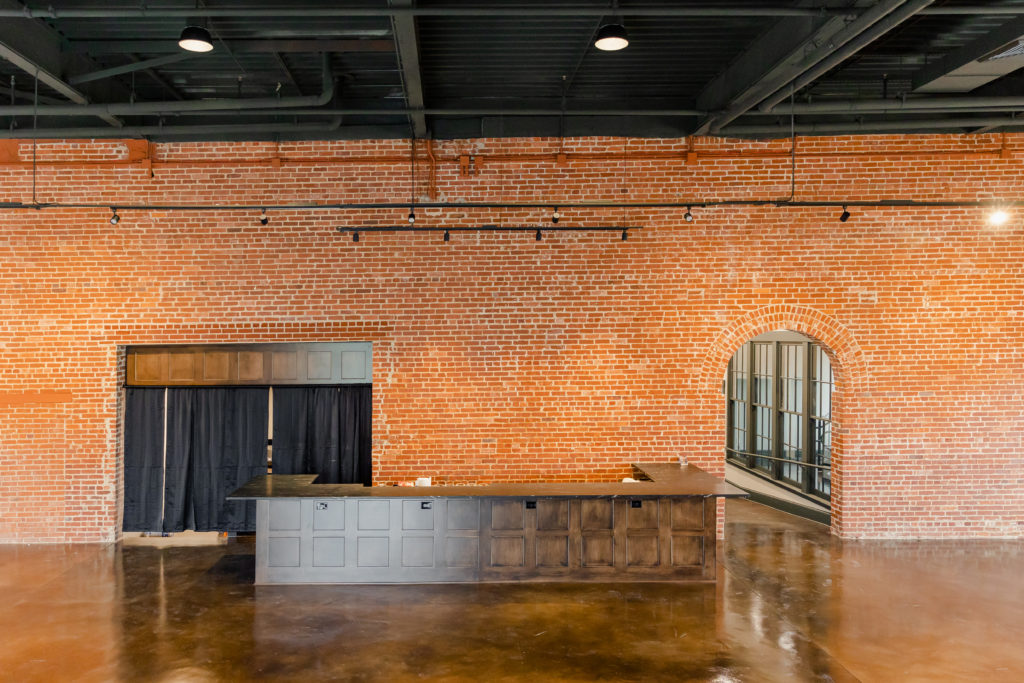 interior of empty union mills event space bar